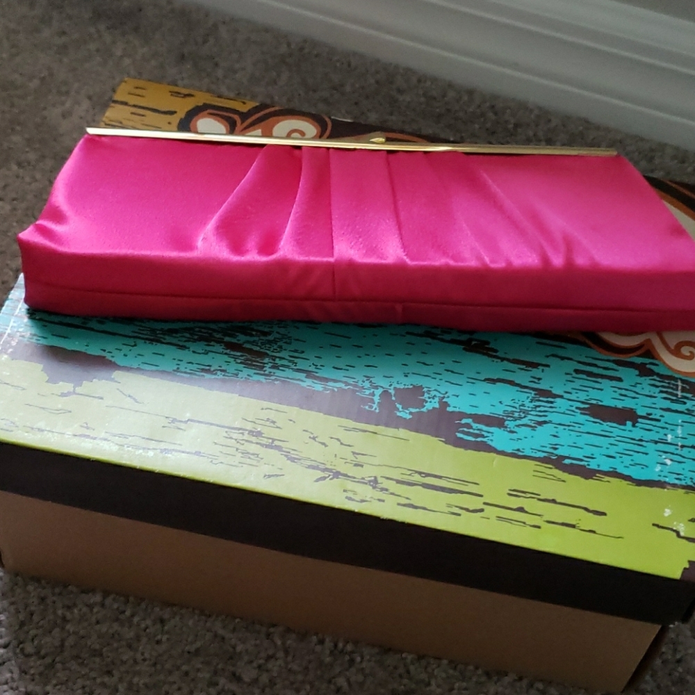 Fuschia clutch bag